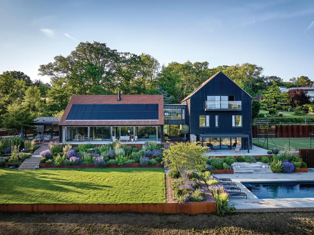Landform Consultants Catherine MacDonald surrey A house with black front and garden