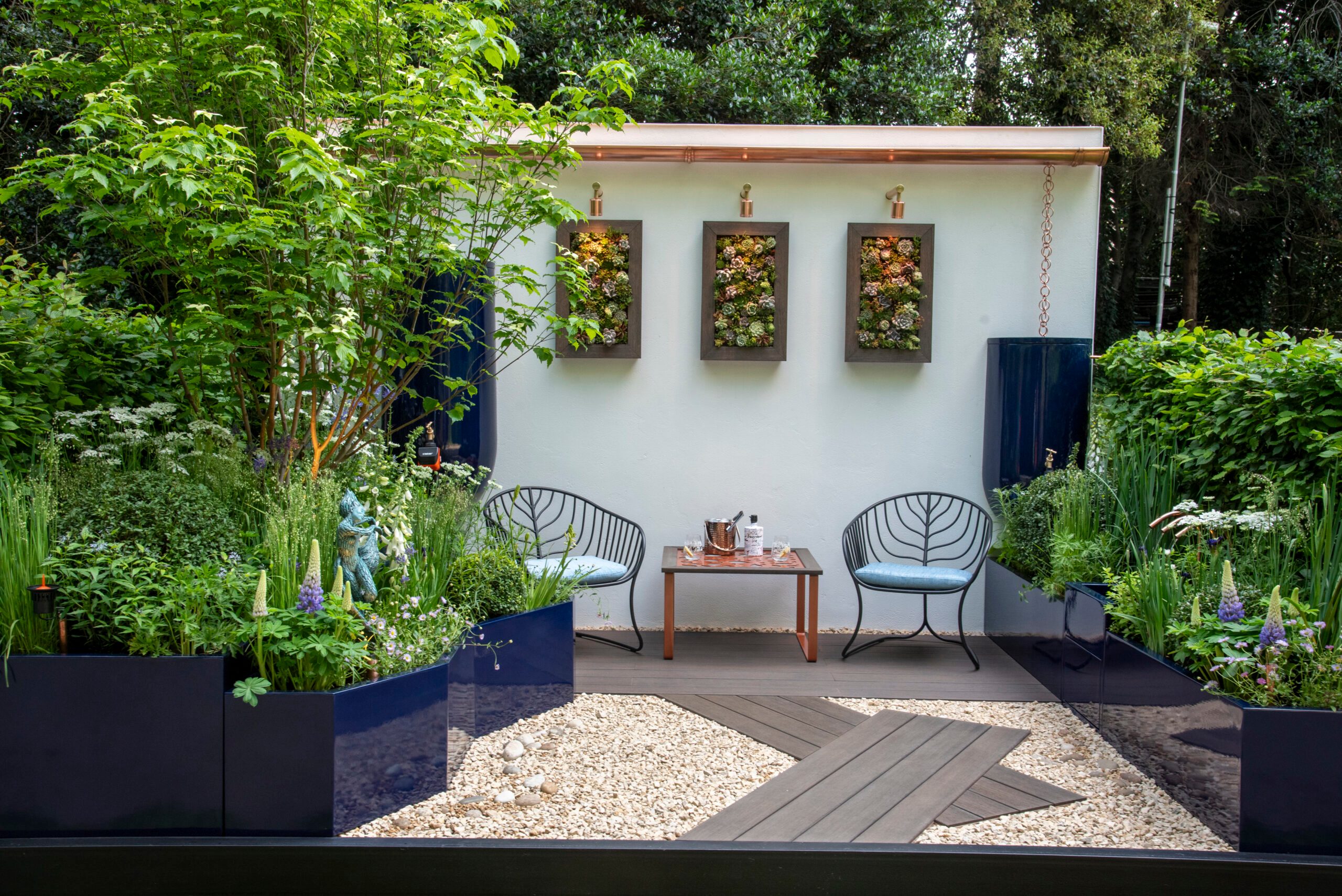 The Water Saving Garden supported by Affinity Water at RHS Chelsea Flower Show. Designed by Sam Proctor. Sponsored by Affinity Water. Container Garden.