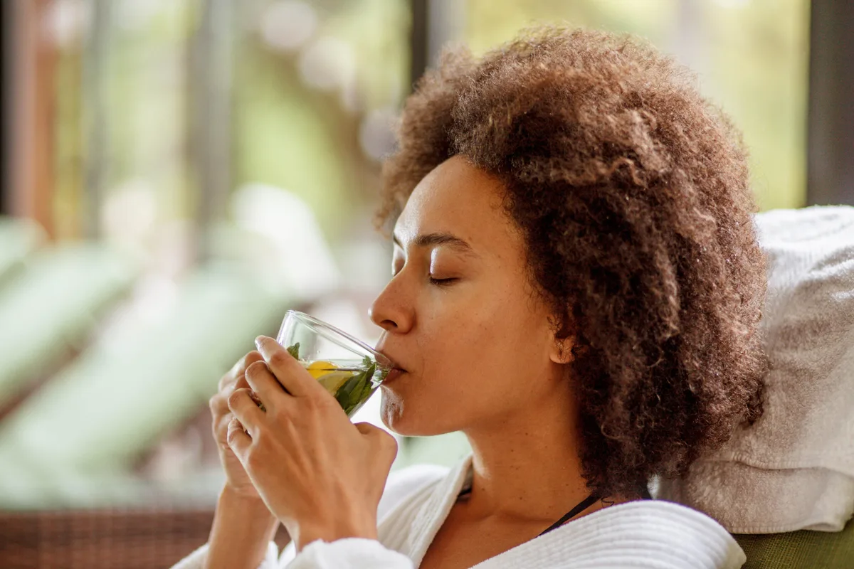 Woman drinking herb tea Woman drinking herb tea