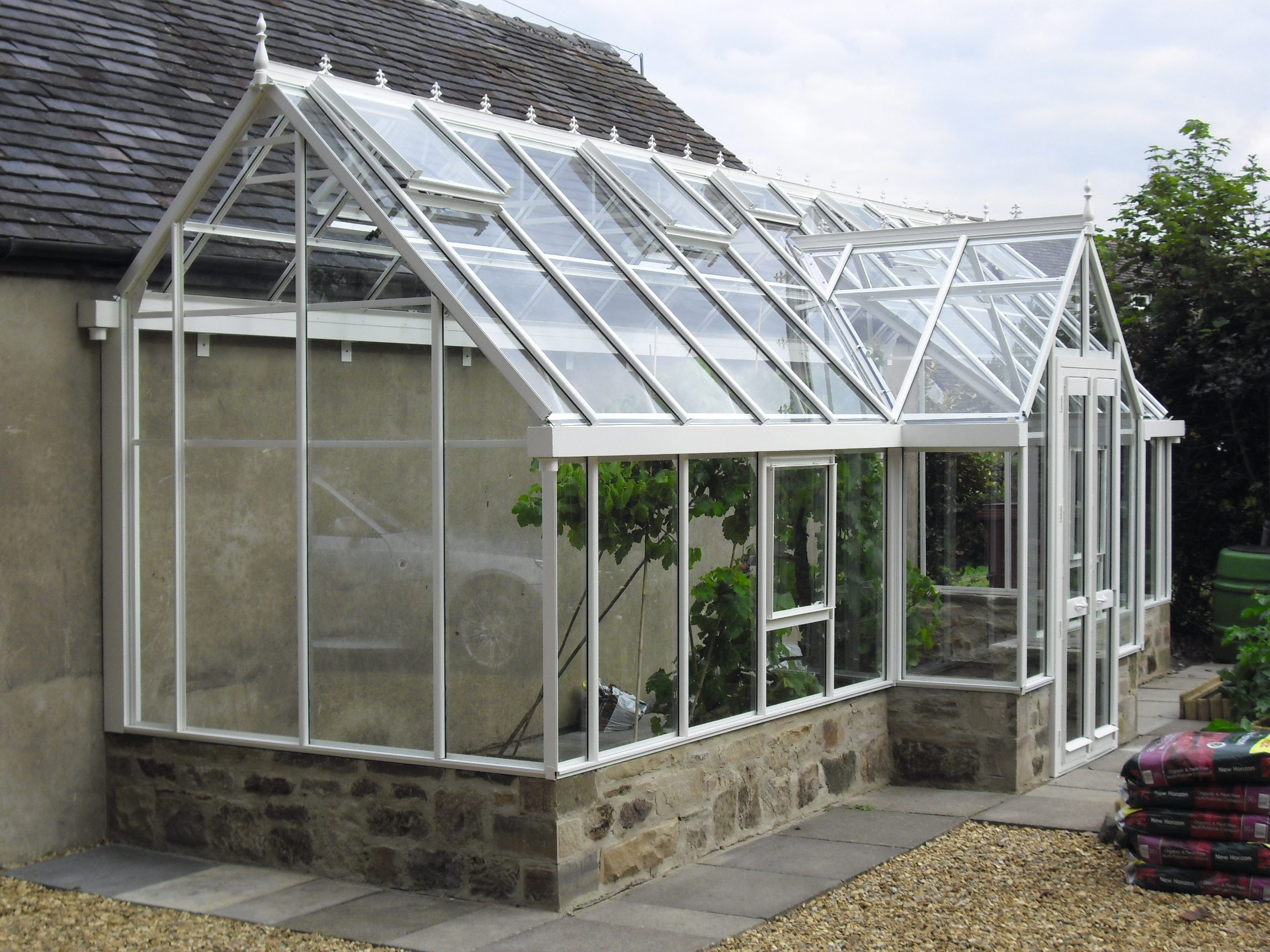 Dovetail greenhouse with dormer porch, best greenhouses with porches, best Victorian greenhouse