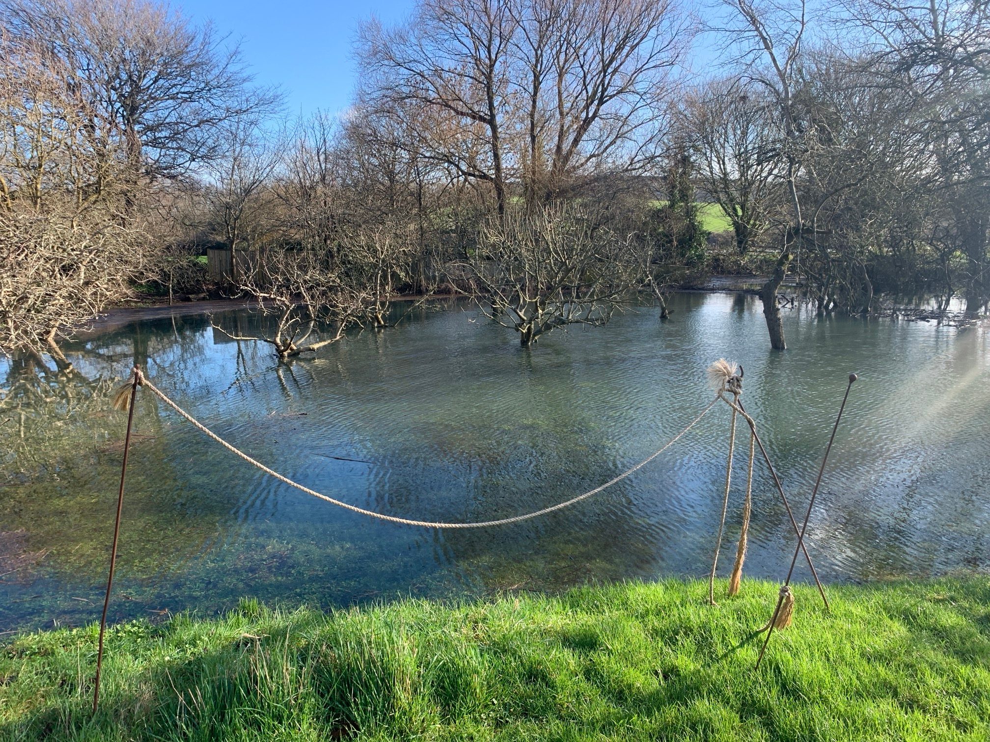 Restricted access and waterlogging in parts of the garden at Alfriston Clergy House in East Sussex