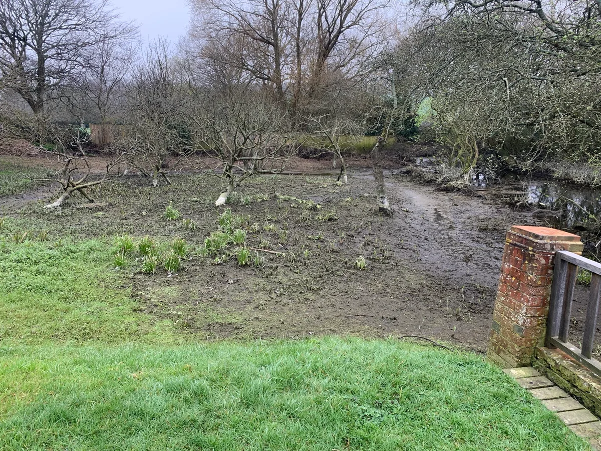 Restricted access and waterlogging in parts of the garden at Alfriston Clergy House in East Sussex Restricted access and waterlogging in parts of the garden at Alfriston Clergy House in East Sussex