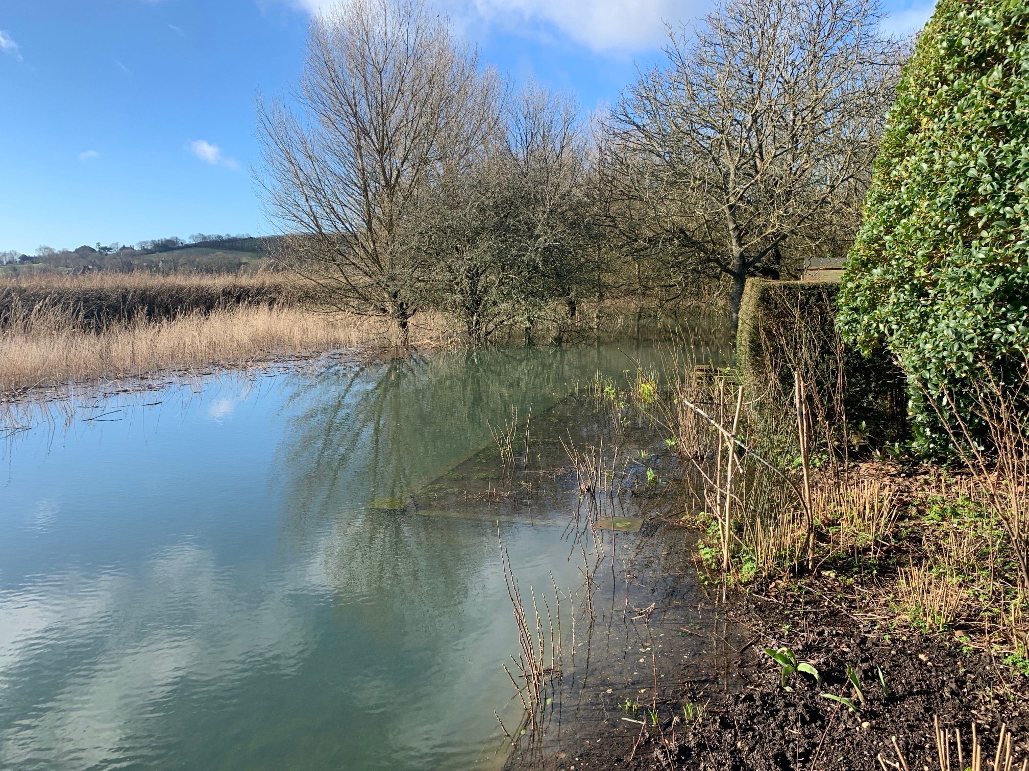 Restricted access and waterlogging in parts of the garden at Alfriston Clergy House in East Sussex