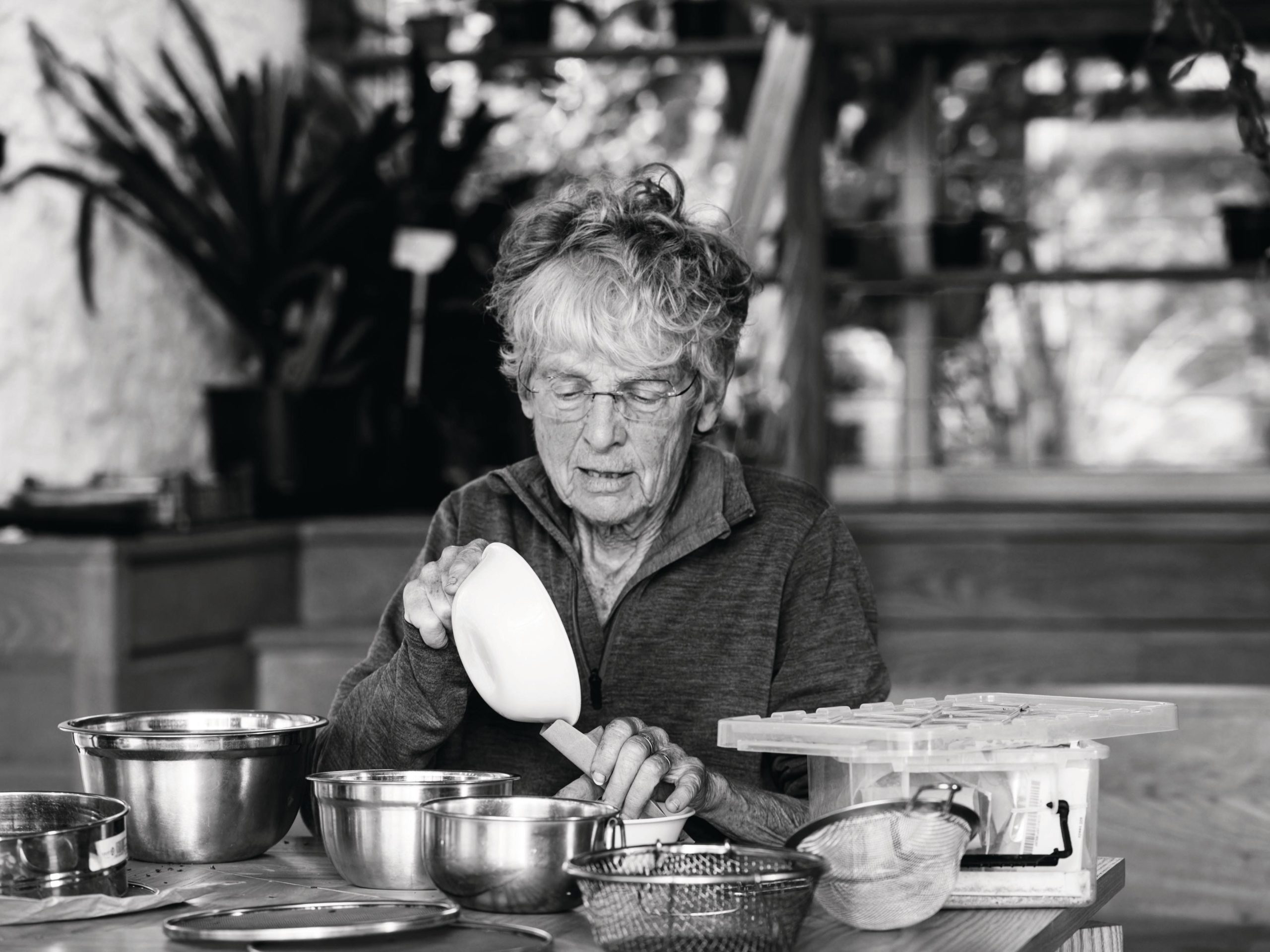 Woman sorting seeds