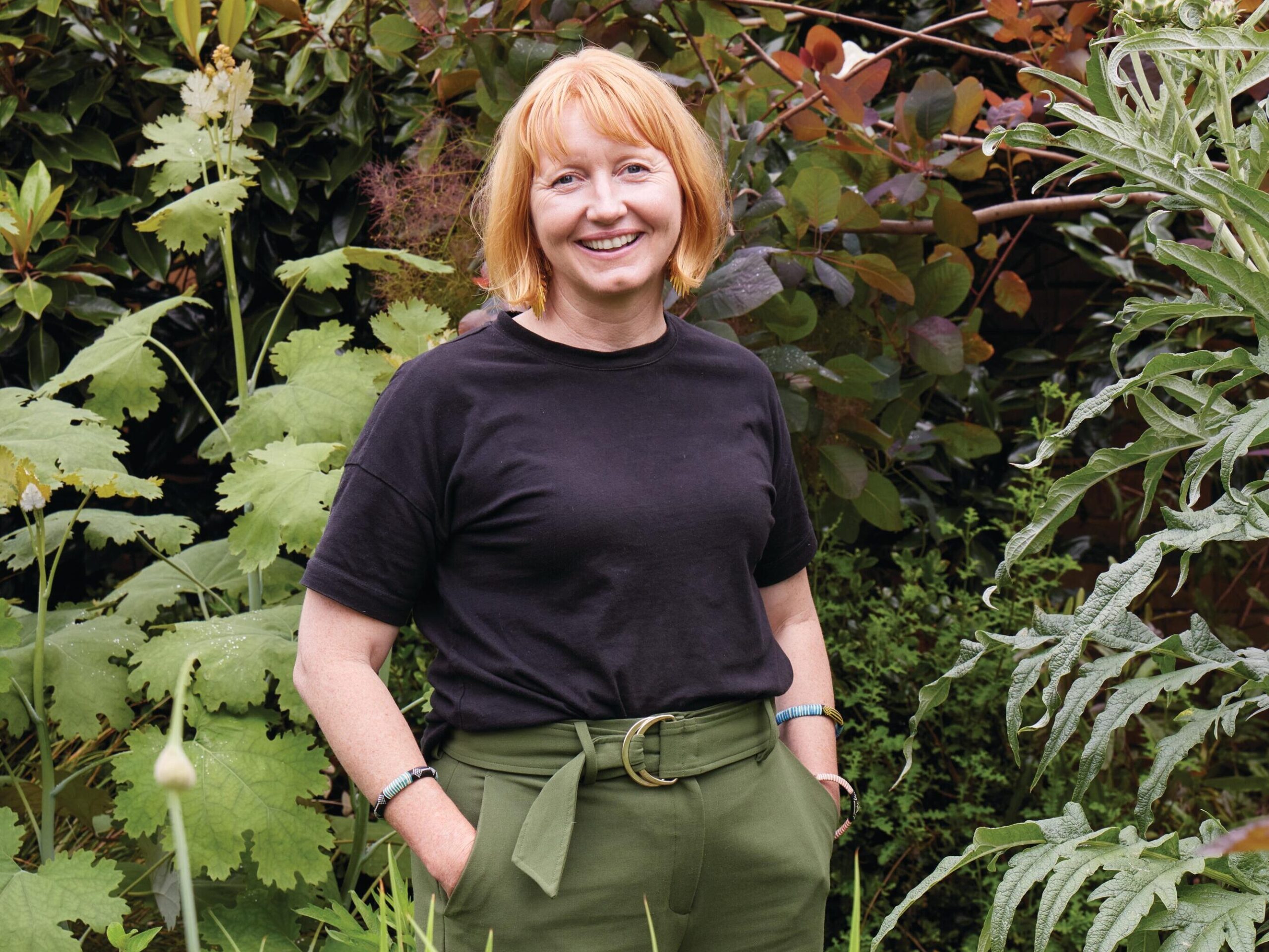 Woman stood in garden