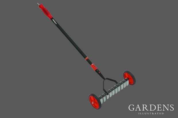 Darlac Lawn Scarifier on a grey background