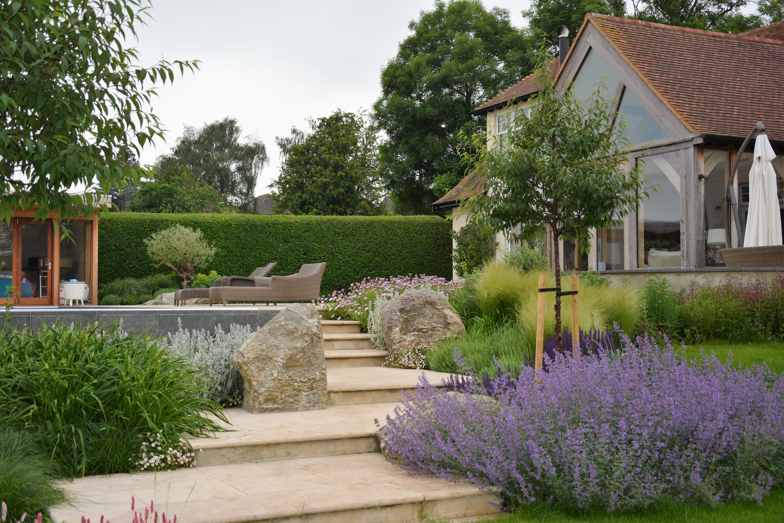 Hard and soft landscaping is balanced in this garden by The Garden Co.