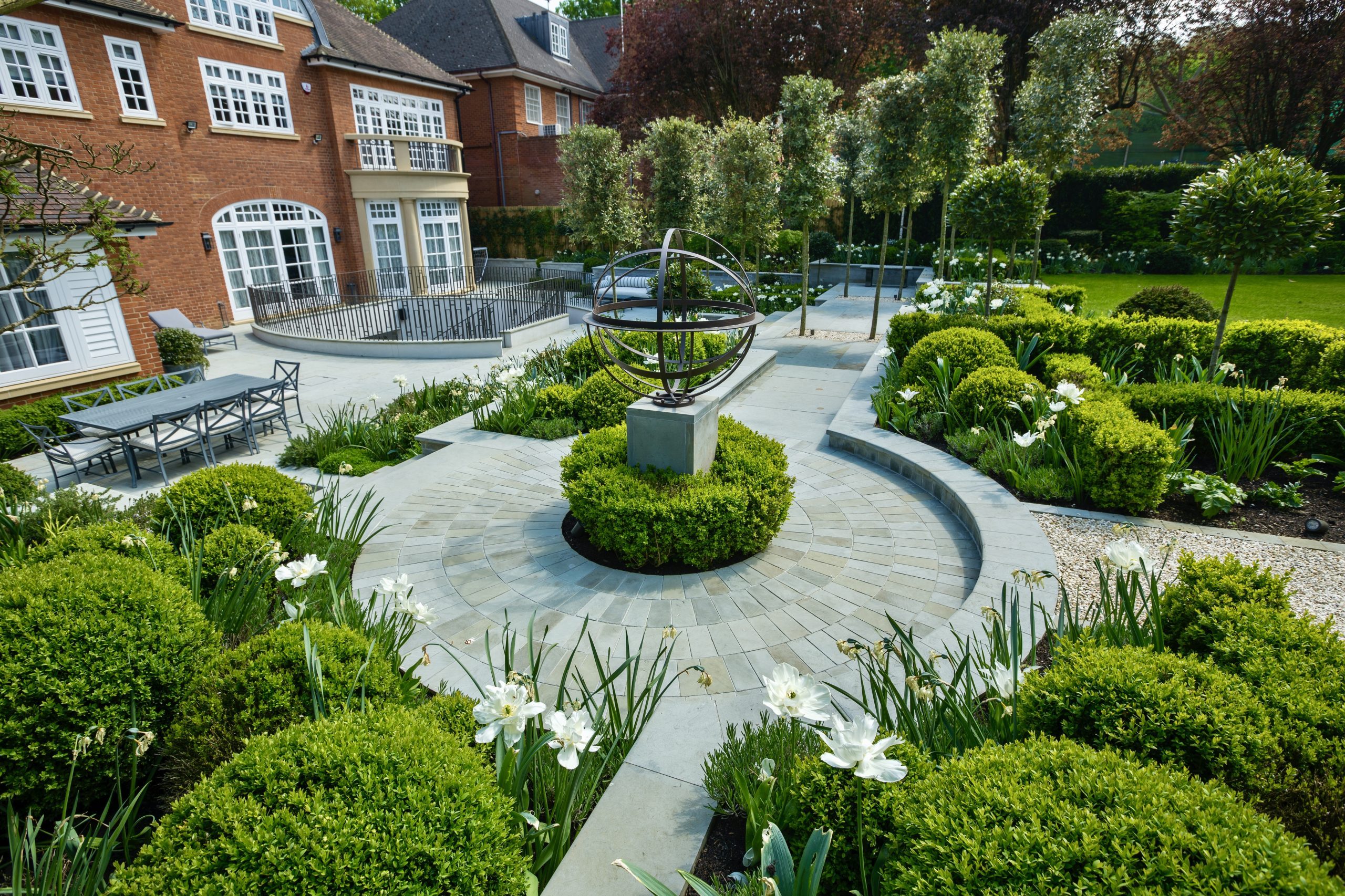 A limited palette of plants and materials used for a seamless design in this garden by Marcus Gilbert Studio.