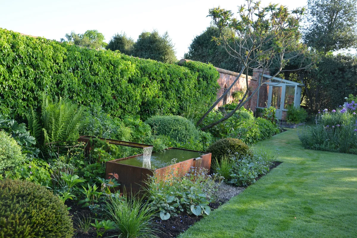 Portfolio 6 Hard landscaping elements are softened with planting.