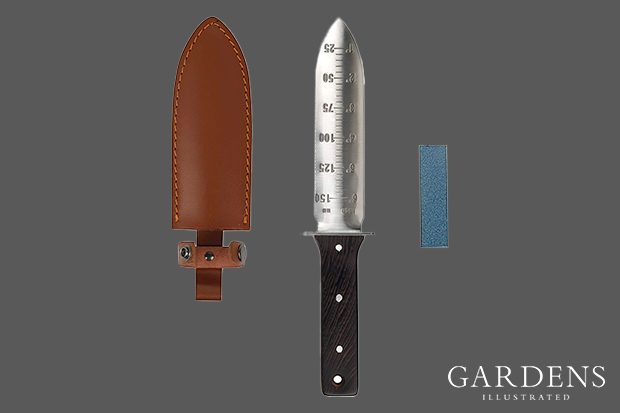 Flora Guard Professional Hori Hori Garden Knife, sheath and sharpening stone on a grey background