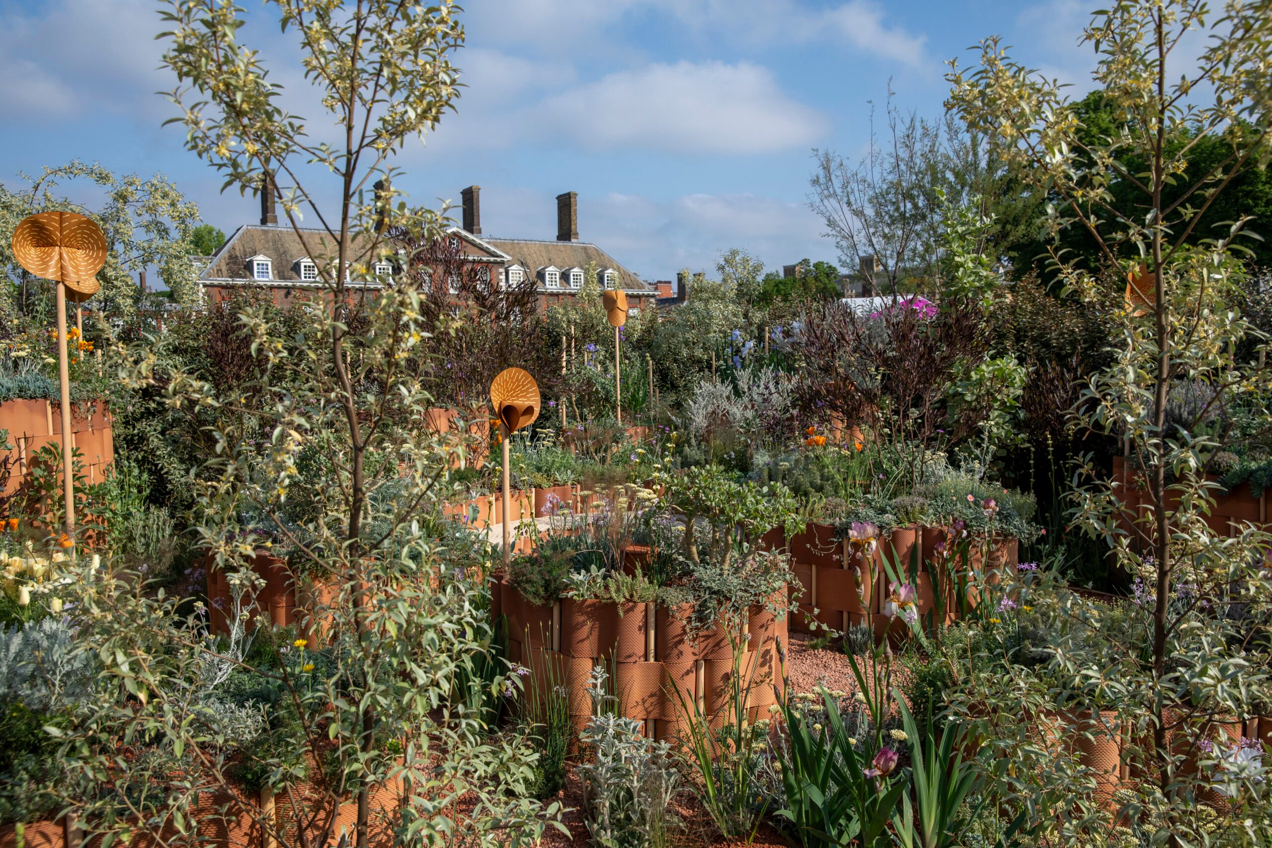 World Child Cancers Nurturing Garden at the RHS Chelsea Flower Show 2024. Designed by Giulio Giorgi. Sponsored by Project Giving Back